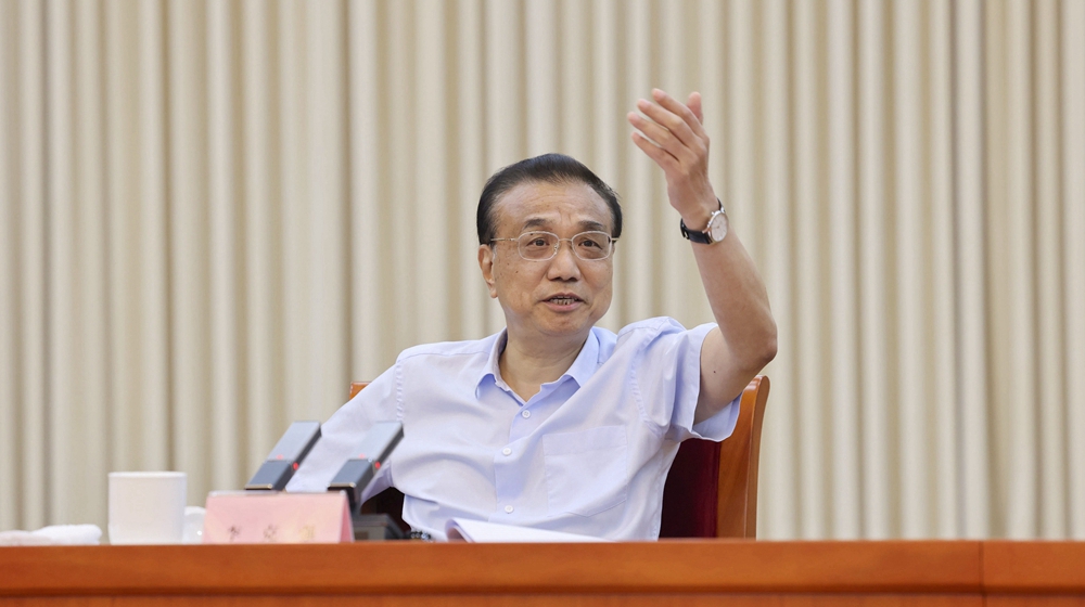 李克強考察政府部門，對就業問題表示關切。 圖：擷取自新華社（資料照）