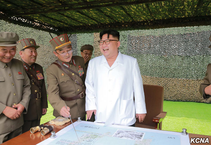 朝鮮中央通訊社20日報導，朝鮮領導人金正恩指導新型地球同步衛星運載火箭用大功率發動機地上點火試驗。 圖：翻攝自朝鮮中央通訊社網站