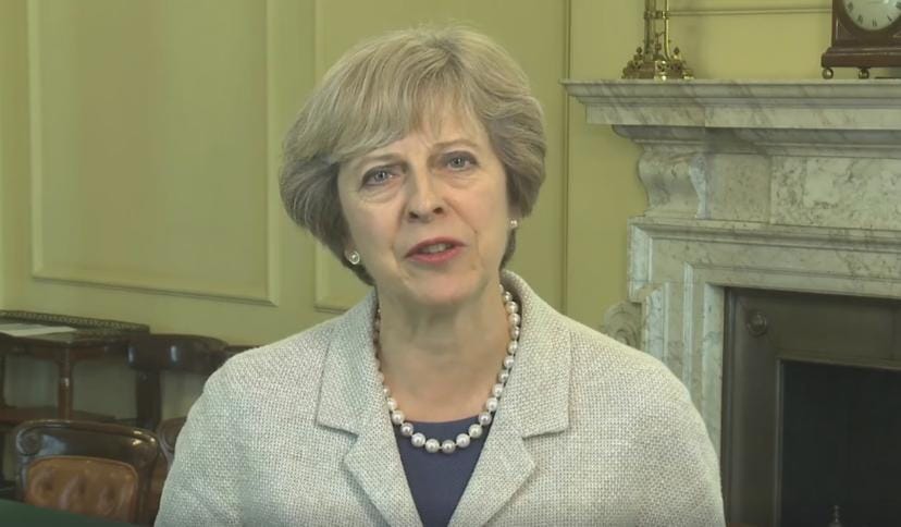 英國首相梅伊是新一代鐵娘子，但如今身陷導彈危機。 圖：截取自梅伊臉書