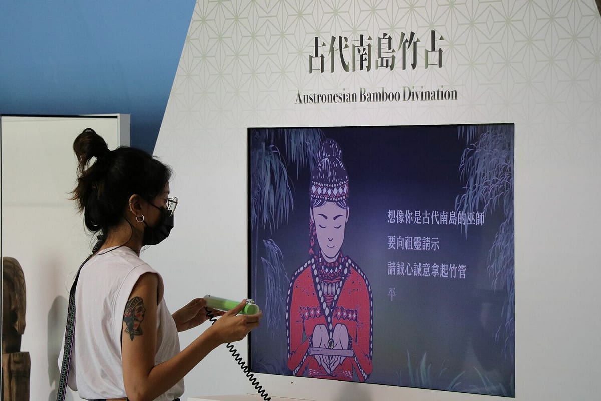 南島竹占互動體驗。 圖：十三行博物館提供