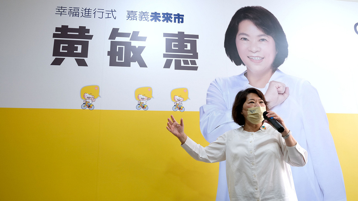黃敏惠競選總部整體以陽光微笑的銘黃色系為主視覺。 圖：黃敏惠競選總部/提供