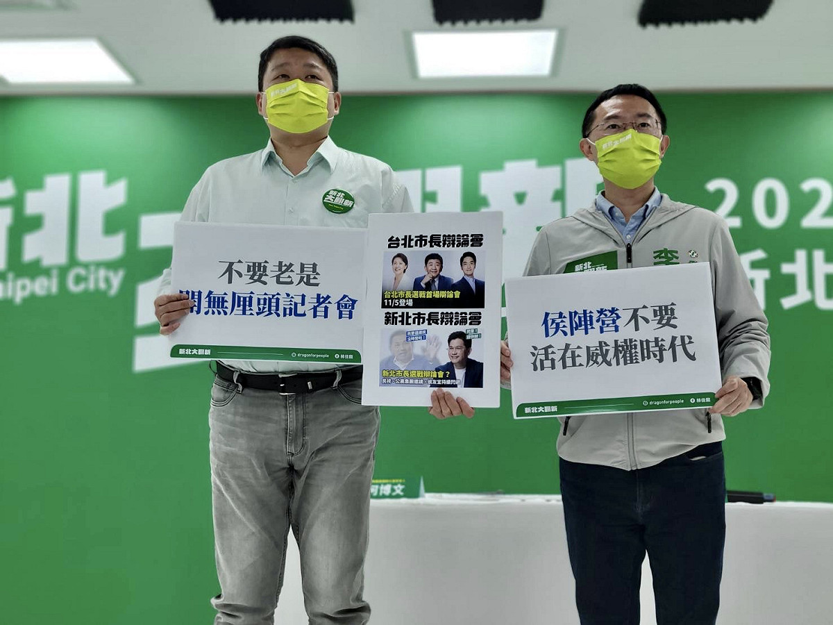 何博文（左）、李坤城開記者會。 圖：林佳龍競辦/提供