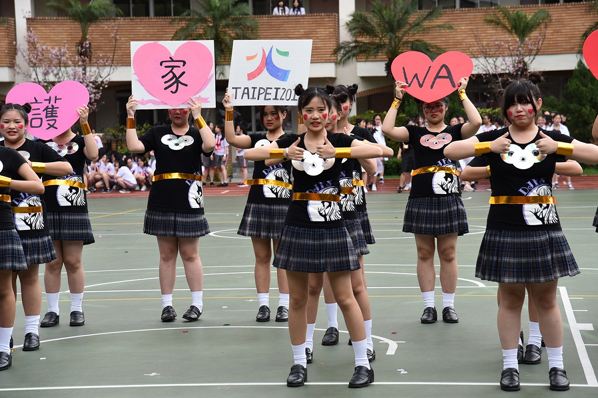 稻江護家19日舉辦創意班歌班呼比賽，適逢臺北市今年主辦世界大學運動會，這次比賽特別融合世大運精神。 圖:稻江家護/提供