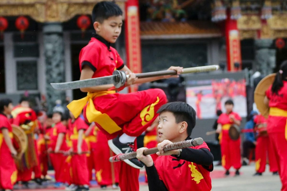 菁寮國小與菁寮國中組成聯隊，展現少年真功夫。 圖:高雄市觀光局/提供