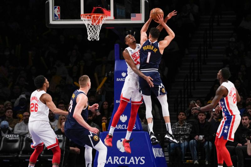金塊前鋒Michael Porter Jr.躍起灌籃。 圖／美聯社／達志影像