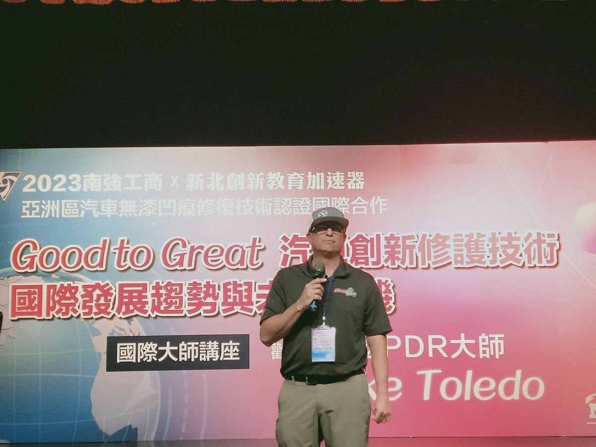 新北市私立南強工商邀請美國汽車無漆凹痕修復大師Myke Toledo進行專題演講，揭開產業發展趨勢與未來商機。 圖：新北市教育局提供