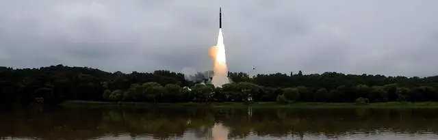 「火星砲-18」試射現場。 圖：翻攝自朝中社