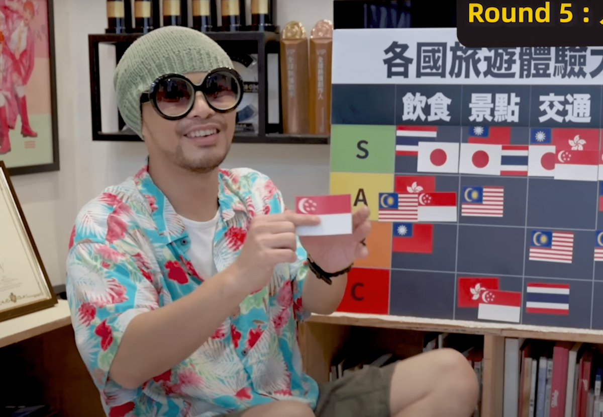 馬來西亞創作鬼才「黃明志」近日他在YT分析最適合旅遊的國家。 圖：翻攝自YT/The Geebai Team 擊敗人團隊