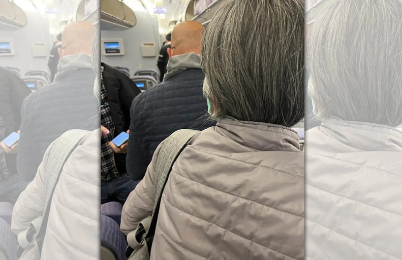 網紅拍下「吃到全套商務餐老外、以及只能吃麵包的中國籍阿姨背影」並Po上網。 圖：翻攝臉書