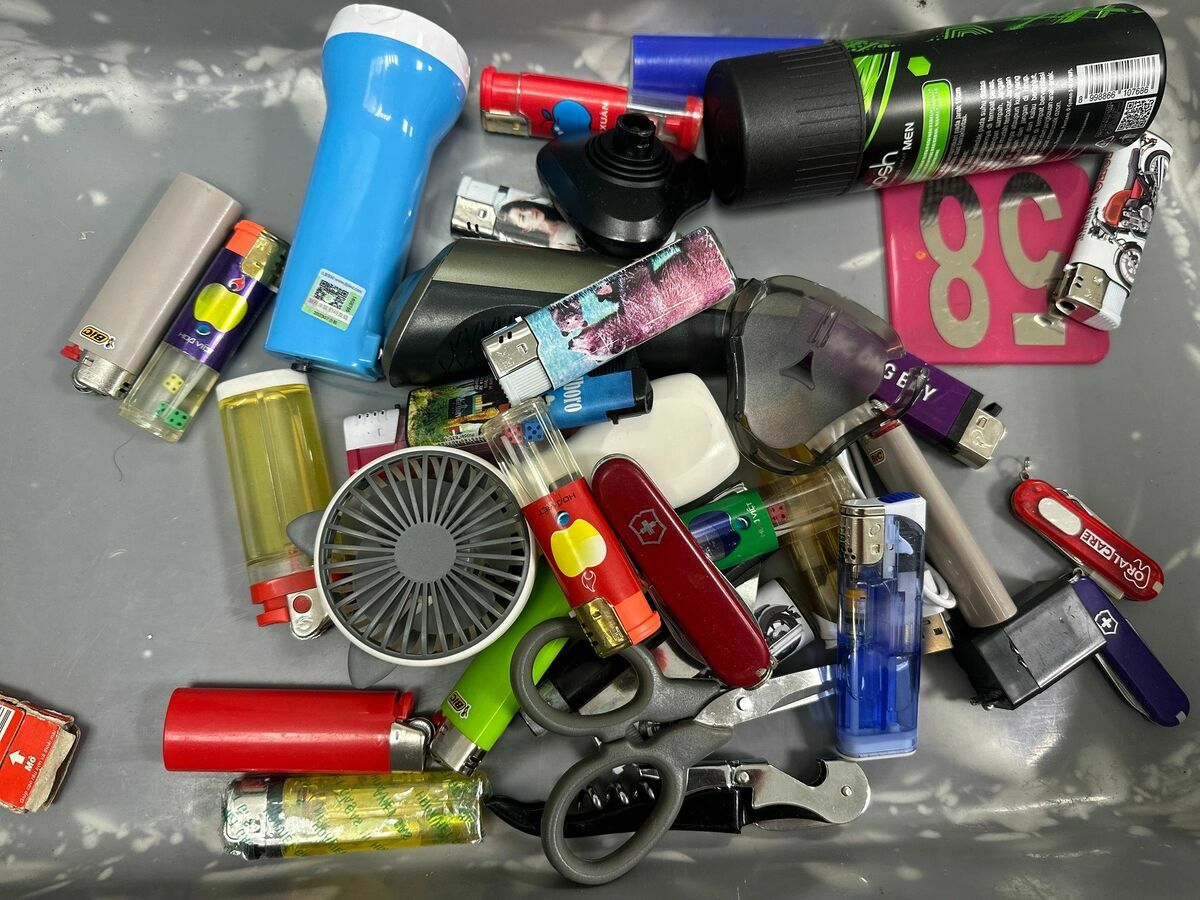 機場公司盤點旅客常見5種危安物品，包含行動電源、傳統打火機、剪刀、美工刀及瑞士刀及含有鉛酸電池的手持式電風扇。 圖/桃園國際機場提供