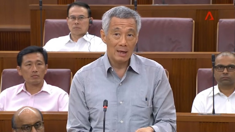 武漢肺炎疫情重創全球經濟，新加坡總理李顯龍坦言，該國旅遊、航空業幾乎已「瀕臨死亡」。 圖：翻攝李顯龍臉書