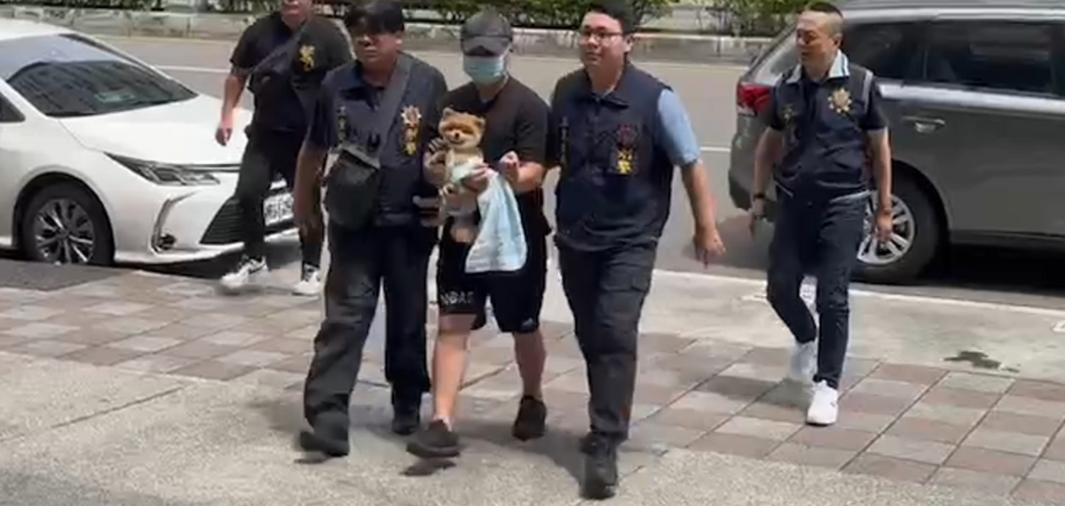 陳女丈夫於12日被押進三重分局。而有消息指出他已坦承犯案，三重警局則出面否認。 圖：翻攝自記者爆料網 臉書