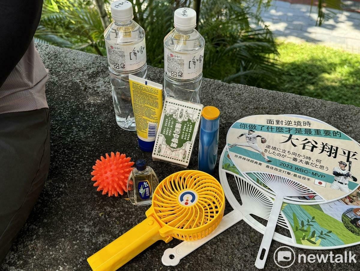 氣溫直直飆升，各種防中暑小物紛紛出爐。 圖：唐復年/攝