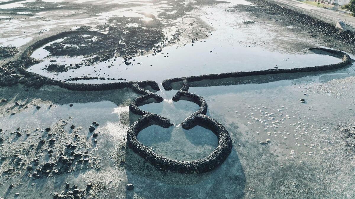 澎湖景點雙心石滬。 圖：交通部觀光署澎湖國家風景區管理處／提供