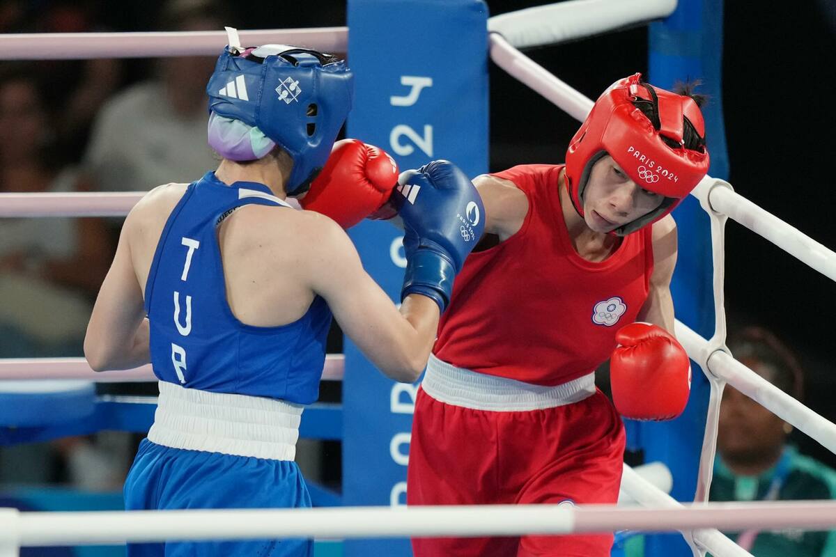 我拳擊好手林郁婷（右）8日一戰，狠K對手，以5：0全勝晉級冠軍賽，舉國慶賀。 圖：翻攝自賴清德Threads／體育署