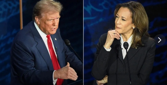 賀錦麗川普稱她是馬克思主義者的指控，反應是滿臉表情包，用右手背托著臉笑，顯然對川普從天而降的邏輯不能理解。 圖 : 影片截圖