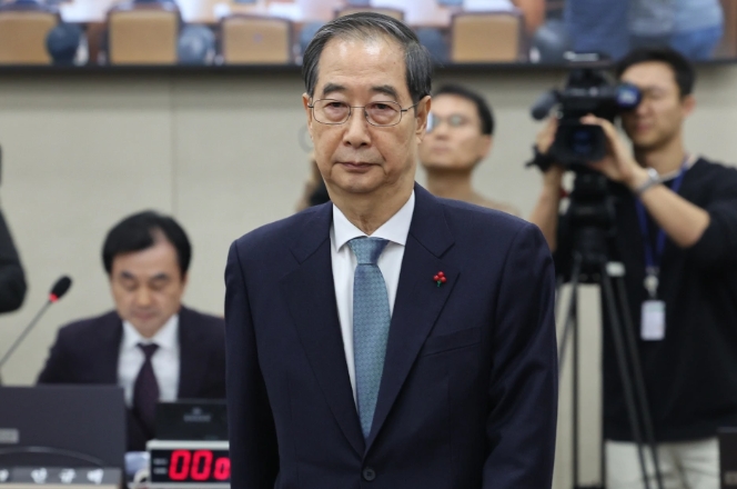 韓憲法法庭24日駁回彈劾案，韓德洙恢復國務總理與代總統職權。(資料照片) 圖 : 翻攝自央視新聞