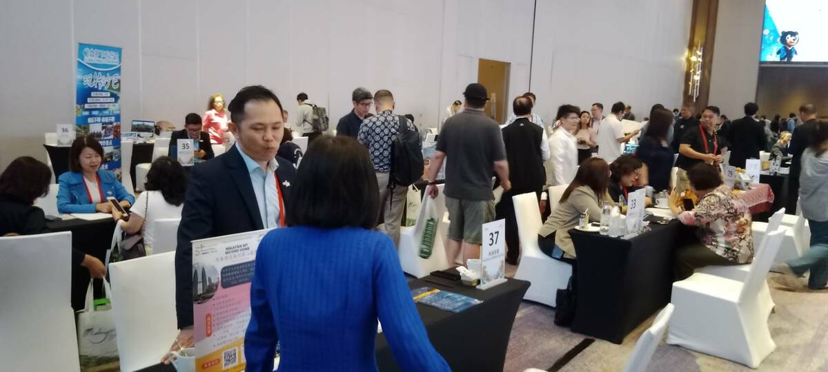 馬來西亞當地旅遊業者來台，與近300位高雄業者面對面交流。 圖：孫家銘/攝