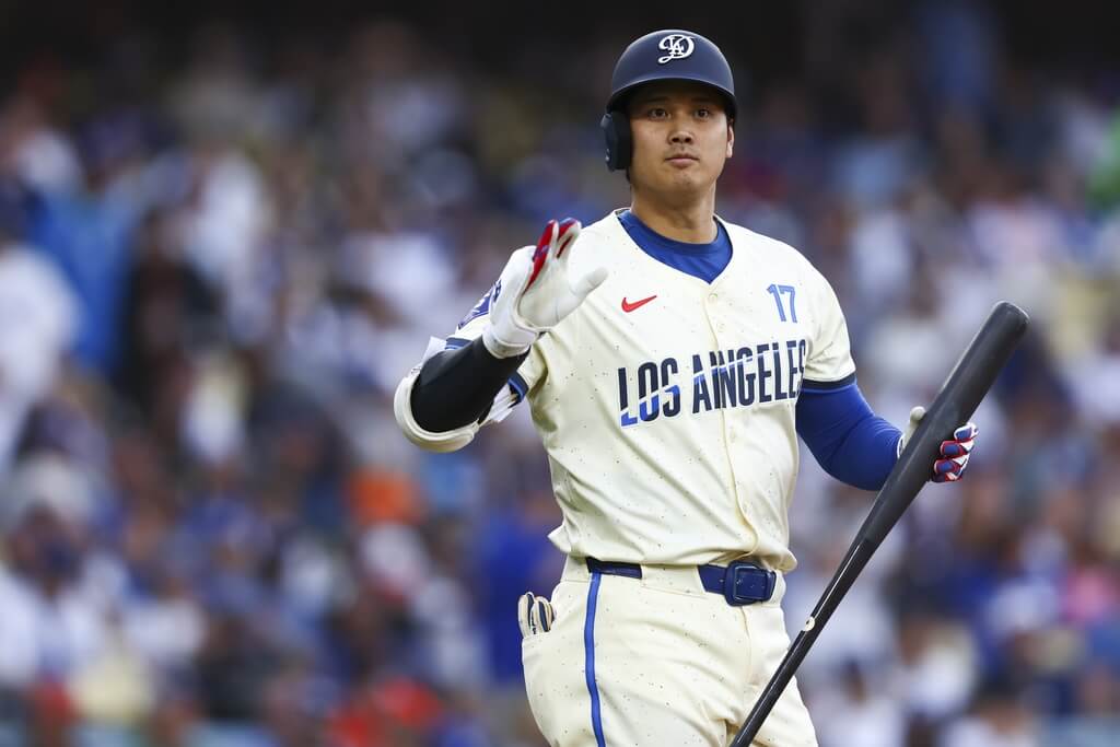 洛杉磯道奇日本球星大谷翔平14日對舊金山巨人擊出雙響砲，達成美國職棒大聯盟MLB生涯250轟里程碑。（美聯社）