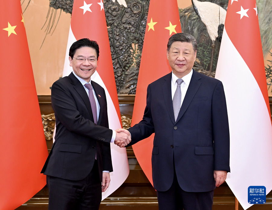 6月24日，中國國家主席習近平會見來訪新加坡總理黃循財。 圖：翻攝陸網/新華網