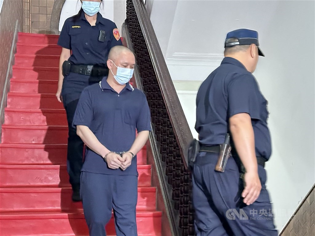 圖為死囚沈文賓（前左）。（中央社檔案照片）