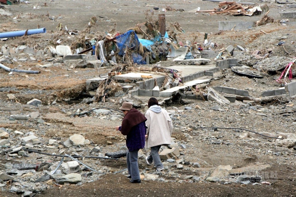 2011年3月11日日本規模9.1強震，宮城縣南三陸町志津川地區被海嘯摧毀。（中央社檔案照片） 圖：中央社提供