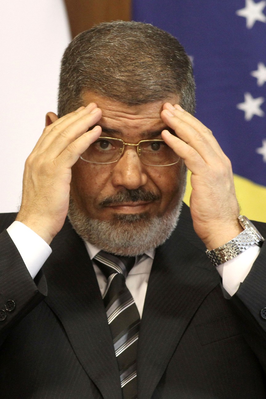 埃及總統穆西(Mohammed Morsi)26日夜晚於開羅發表演說認錯。圖片來源：達志影像/美聯社。