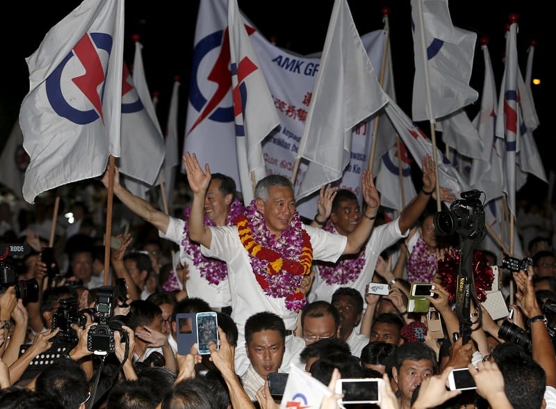 新加坡11日舉行第17屆國會選舉，李顯龍領導的人民行動黨（PAP）最後仍贏得大選，繼續執政。圖片來源：達志影像/路透社