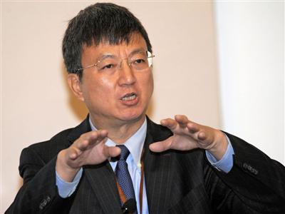 朱民曾任中國銀行國際金融研究所所長、中國銀行 (香港)有限公司重組項目辦公室負責人、香港國華銀行董事、中國銀行副行長等職務。圖片來源：中央社