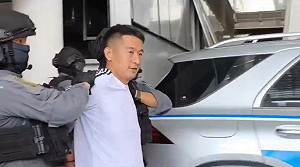 (影)「緬北電詐教父」余智江泰國引渡返中 驚爆與趙薇前夫為表兄弟