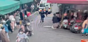 北市興德市場男子持刀揮舞！搶攤位刀自砍脖子 警火速壓制送醫