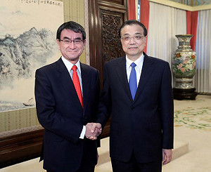 會見日本外相談中日關係  李克強：乍暖還寒望倍加珍惜