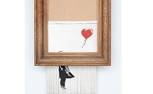 (影) 班克西自毀畫 仍以高額104萬英鎊賣出