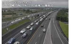 收假北返車潮湧現 國5頭城-坪林交控時速38km 雪隧回堵3.5公里