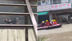 高雄超大豪雨全市大淹水 民眾水中游泳苦中作樂