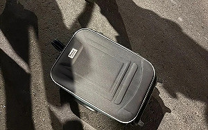 人生真是太刺激！華中橋天降行李箱  等紅燈機車騎士頭遭砸傷