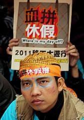 爭血拼休假權 千名移工上街