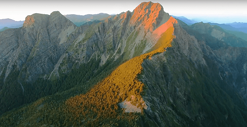 外交部變魔法部？國慶影片將玉山變瑞士山區 急刪重上架