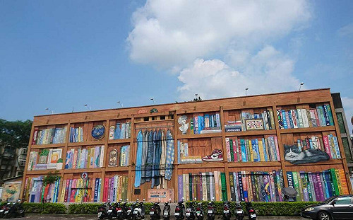 巨大書牆彩繪現身高雄！10月連假到旗津玩沙聽音樂