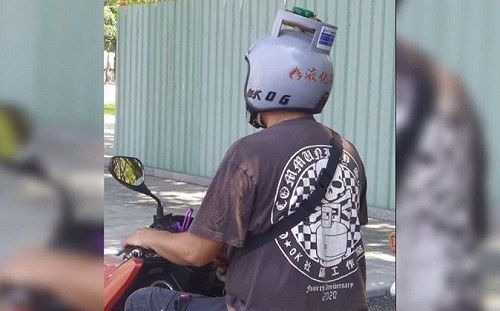 機車騎士大秀超吸睛瓦斯桶安全帽