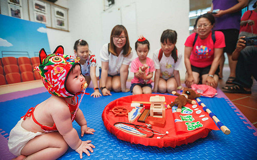 疫後「福虎度晬趣」重現紅毛港   端午連假體驗抓週古禮