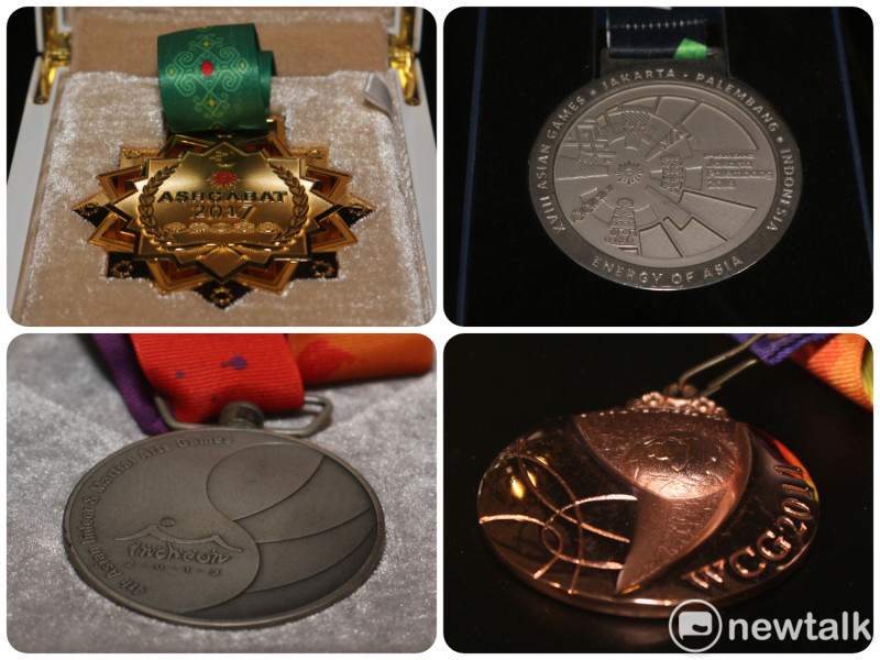 從左上至右下分別是：2017亞室武運金牌、2018亞運銀牌(示範賽)、2013亞室武運銀牌、2011 WCG世界電競大賽銅牌。 圖：陳耀宗／攝