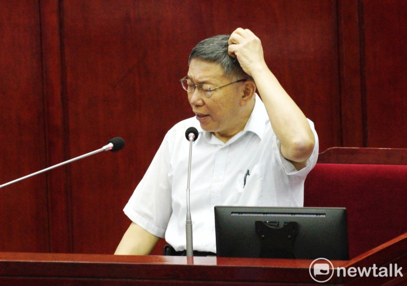 台北市長柯文哲在台北市議會進行施政報告並備質詢。   圖：張良一 / 攝