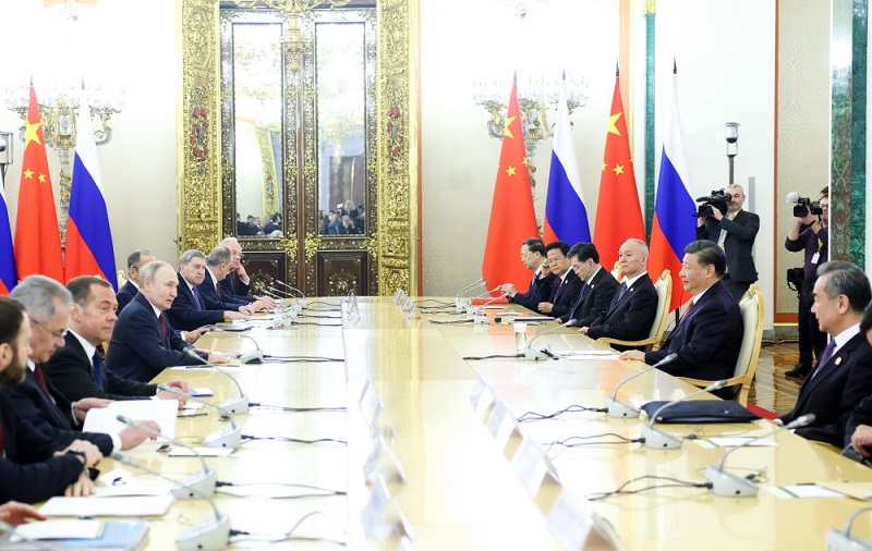 中共領導人習近平（左）訪俄羅斯，在21日會見總統普丁（Vladimir Putin，右），雙方簽署聯合聲明。圖：翻攝自新華社