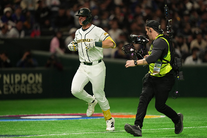  澳洲隊帕金斯敲出一發兩分後全壘打後回壘時慶祝。圖：達志影像／美聯社