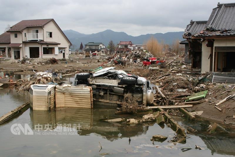 美國「科學雜誌」的報告指出，美國在2012到2017年間來自日本的海嘯漂流物上，發現共計289種生物。圖為2011年日本311地震後住宅區狀況。   圖 : 中央社
