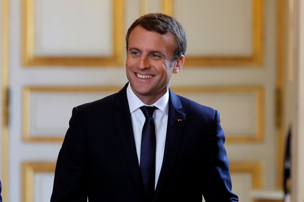 法國總統在今年五月，由39歲馬克宏擊敗極右派領袖瑪琳成為總統。   圖：達志影像/路透社