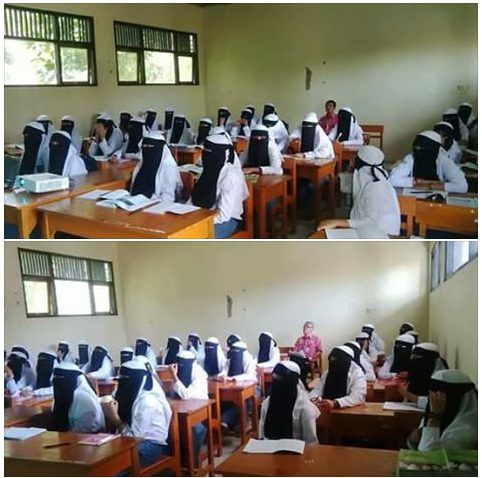 印尼的社群網站流傳，中爪哇某所高中女學生戴全罩面紗上課的照片，引發關注。   圖：翻攝Andi Abu Aytam 臉書