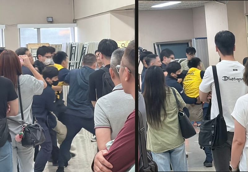  時代力量謝閔弘因情緒激動、與警方發生肢體衝突，而被抬出會場；隨後待其情緒恢復後才重返會場。 圖：李宣萱/攝 
