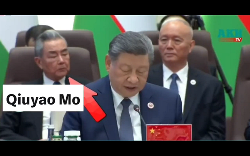 王毅與蔡奇的表情受到網路關注，有網友表示兩人似乎對習近平的發言內容感到不屑。 圖:翻攝自影片